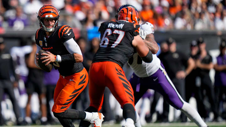 Cincinnati Bengals quarterback Joe Burrow (9) drops back with the ball in the third quarter of the NFL Week 5 game between the Cincinnati Bengals and Baltimore Ravens at Paycor Stadium in downtown Cincinnati on Sunday, Oct. 6, 2024. The Bengals fell to 1-4 on the season with a 41-38 loss to the Ravens. Cincinnati Bengals quarterback Joe Burrow (9) drops back with the ball in the third quarter of the NFL Week 5 game between the Cincinnati Bengals and Baltimore Ravens at Paycor Stadium in downtown Cincinnati on Sunday, Oct. 6, 2024. The Bengals fell to 1-4 on the season with a 41-38 loss to the Ravens.