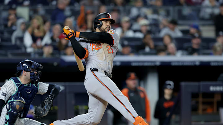 Sep 25, 2024; Bronx, New York, USA; Baltimore Orioles right fielder Anthony Santander (25) follows through on an RBI double against the New York Yankees during the fourth inning at Yankee Stadium. Mandatory Credit: Brad Penner-Imagn Images