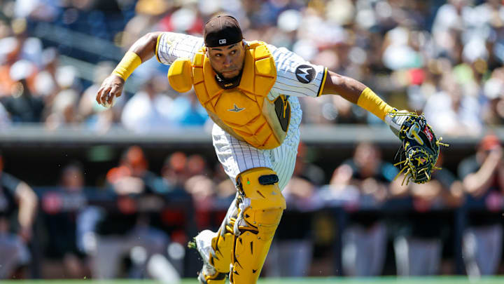 Sep 3, 2025; San Diego, California, USA; San Diego Padres catcher Elias Diaz (17) throws to first base during the second inning against the Baltimore Orioles at Petco Park. Mandatory Credit: David Frerker-Imagn Images