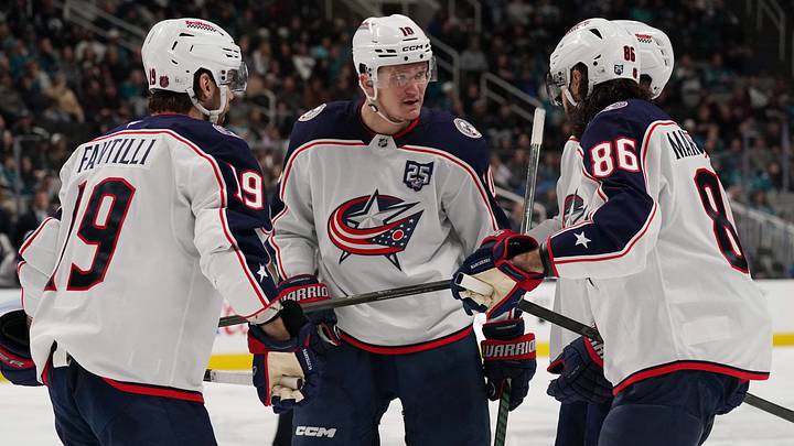 Jan 6, 2026; San Jose, California, USA;  Columbus Blue Jackets left winger Dmitri Voronkov (10), Adam Fantilli (19), and right winger Kirill Marchenko (86) huddle during a break in the action against the San Jose Sharks in the third period at SAP Center at San Jose. Mandatory Credit: David Gonzales-Imagn Images