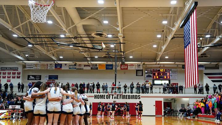 The Mount Notre Dame Cougars huddle before an OHSAA Division I girls regional final game against the Springboro Panthers, Saturday, March 9, 2024, at Lakota West High School in West Chester Township, Ohio. The Mount Notre Dame Cougars huddle before an OHSAA Division I girls regional final game against the Springboro Panthers, Saturday, March 9, 2024, at Lakota West High School in West Chester Township, Ohio.