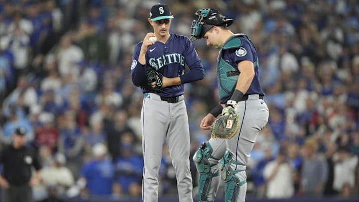 Oct 20, 2025; Toronto, Ontario, CAN; Seattle Mariners catcher Cal Raleigh (29) talks with pitcher George Kirby (68) in the first inning against the Toronto Blue Jays during game seven of the ALCS round for the 2025 MLB playoffs at Rogers Centre. Mandatory Credit: John E. Sokolowski-Imagn Images Oct 20, 2025; Toronto, Ontario, CAN; Seattle Mariners catcher Cal Raleigh (29) talks with pitcher George Kirby (68) in the first inning against the Toronto Blue Jays during game seven of the ALCS round for the 2025 MLB playoffs at Rogers Centre. Mandatory Credit: John E. Sokolowski-Imagn Images
