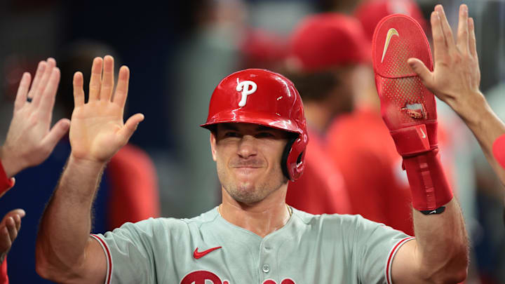 Sep 5, 2025; Miami, Florida, USA; Philadelphia Phillies catcher J.T. Realmuto (10) celebrates after scoring against the Miami Marlins during the fourth inning at loanDepot Park. Sep 5, 2025; Miami, Florida, USA; Philadelphia Phillies catcher J.T. Realmuto (10) celebrates after scoring against the Miami Marlins during the fourth inning at loanDepot Park.