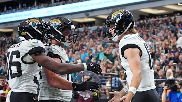 Nov 2, 2025; Paradise, Nevada, USA; Jacksonville Jaguars quarterback Trevor Lawrence (16) scores a touchdown during the second half against the Las Vegas Raiders at Allegiant Stadium. Mandatory Credit: Kirby Lee-Imagn Images