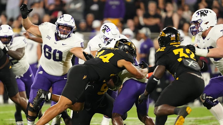 Sep 26, 2025; Tempe, Arizona, USA; Arizona State Sun Devils linebacker Keyshaun Elliott (44) makes a tackle for loss against the TCU Horned Frogs in the first half at Mountain America Stadium, Home of the ASU Sun Devils. Mandatory Credit: Jacob Reiner-Imagn Images Sep 26, 2025; Tempe, Arizona, USA; Arizona State Sun Devils linebacker Keyshaun Elliott (44) makes a tackle for loss against the TCU Horned Frogs in the first half at Mountain America Stadium, Home of the ASU Sun Devils. Mandatory Credit: Jacob Reiner-Imagn Images