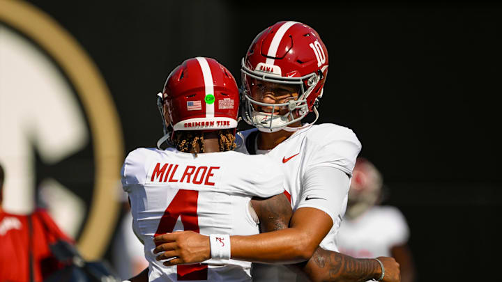 Oct 5, 2024; Nashville, Tennessee, USA;  Alabama Crimson Tide quarterback Jalen Milroe (4) and quarterback Austin Mack (10) get ready for the game against the Vanderbilt Commodores at FirstBank Stadium. Mandatory Credit: Steve Roberts-Imagn Images