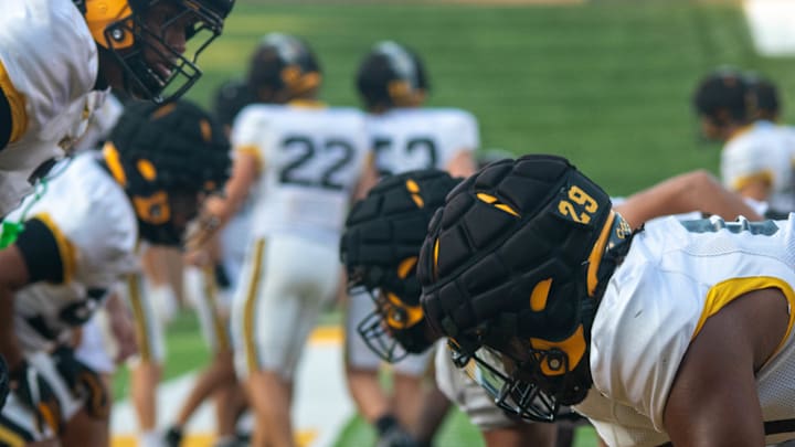 Aug 17, 2024; Columbia, Missouri, USA; Offensive and defensive linemen warm up at the Missouri Tigers annual fan night practice at Faurot Field at Memorial Stadium. Aug 17, 2024; Columbia, Missouri, USA; Offensive and defensive linemen warm up at the Missouri Tigers annual fan night practice at Faurot Field at Memorial Stadium.