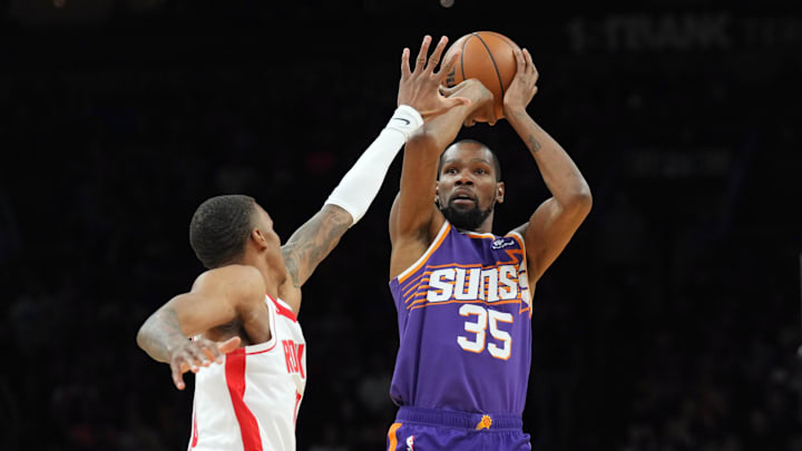 Mar 2, 2024; Phoenix, Arizona, USA; Phoenix Suns forward Kevin Durant (35) shoots against the Houston Rockets during the second half at Footprint Center. Mandatory Credit: Joe Camporeale-Imagn Images