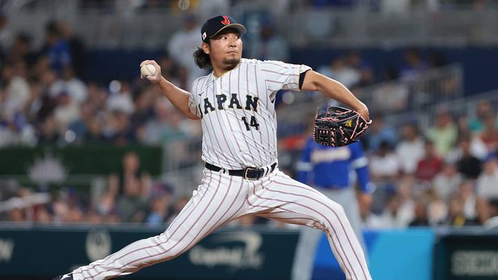 Miami, FL, United States; Japan pitcher Hiromi Itoh (14) delivers a pitch against Venezuela in the sixth inning during a quarterfinal game of the 2026 World Baseball Classic at loanDepot Park. Mandatory Credit: Sam Navarro-Imagn Images