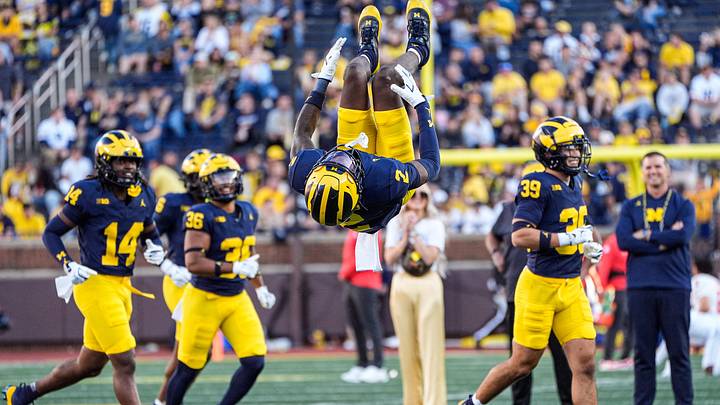 Michigan defensive back Shamari Earls (2) jumps for a backflip during warm up ahead of the New Mexico game at Michigan Stadium in Ann Arbor on Saturday, August 30, 2025. Michigan defensive back Shamari Earls (2) jumps for a backflip during warm up ahead of the New Mexico game at Michigan Stadium in Ann Arbor on Saturday, August 30, 2025.