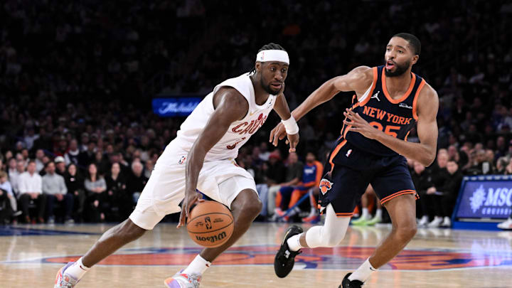 Oct 28, 2024; New York, New York, USA; Cleveland Cavaliers guard Caris LeVert (3) drives to the basket while being defended by New York Knicks forward Mikal Bridges (25) during the second half at Madison Square Garden. Mandatory Credit: John Jones-Imagn Images
