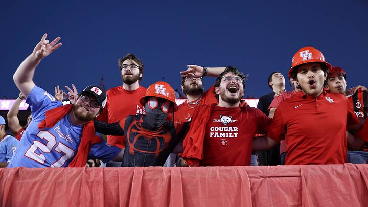 Nov 22, 2025; Houston, Texas, USA; Houston Cougars fans cheer during the game against the TCU Horned Frogs at TDECU Stadium. Mandatory Credit: Troy Taormina-Imagn Images Nov 22, 2025; Houston, Texas, USA; Houston Cougars fans cheer during the game against the TCU Horned Frogs at TDECU Stadium. Mandatory Credit: Troy Taormina-Imagn Images