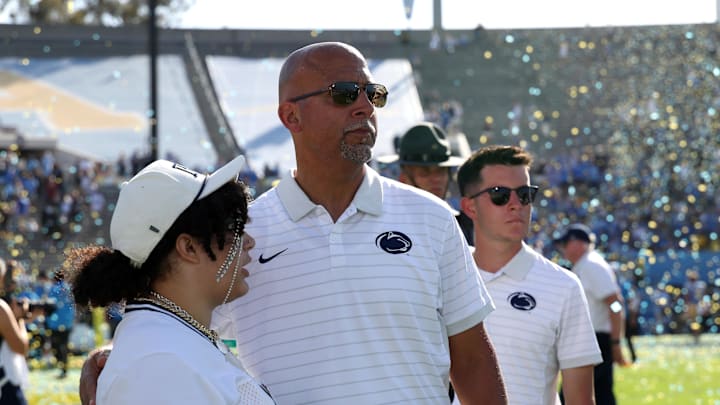 Oct 4, 2025; Pasadena, California, USA;  Penn State Nittany Lions head coach James Franklin (middle) looks on after defeated by UCLA Bruins 42-37 at Rose Bowl. Mandatory Credit: Kiyoshi Mio-Imagn Images