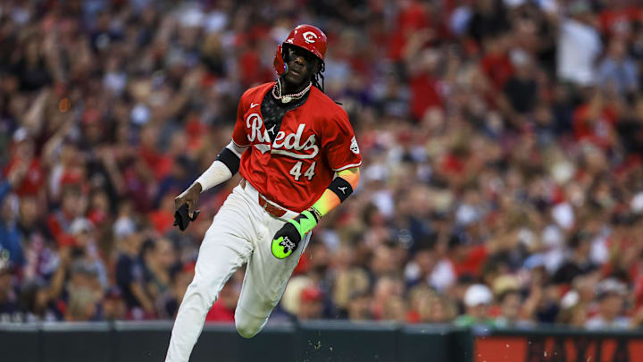 Jun 11, 2024; Cincinnati, Ohio, USA; Cincinnati Reds shortstop Elly De La Cruz (44) scores on a RBI single hit by first baseman Spencer Steer (not pictured) in the sixth inning against the Cleveland Guardians at Great American Ball Park. Mandatory Credit: Katie Stratman-USA TODAY Sports
