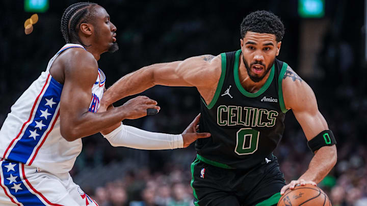 Apr 28, 2026; Boston, Massachusetts, USA; Boston Celtics forward Jayson Tatum (0) drives the ball against Philadelphia 76ers guard Tyrese Maxey (0) in the second half during game five of the first round of the 2026 NBA Playoffs at TD Garden. Mandatory Credit: David Butler II-Imagn Images
