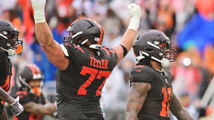 Oct 19, 2025; Cleveland, Ohio, USA; Cleveland Browns guard Wyatt Teller (77) celebrates after running back Quinshon Judkins (10) scored a touchdown during the first half against the Miami Dolphins at Huntington Bank Field. Mandatory Credit: Ken Blaze-Imagn Images