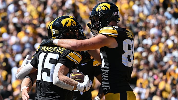 Aug 31, 2024; Iowa City, Iowa, USA; Iowa Hawkeyes wide receiver Reece Vander Zee (15) and tight end Luke Lachey (85) react after a touchdown by Vander Zee during the fourth quarter against the Illinois State Redbirds at Kinnick Stadium. Mandatory Credit: Jeffrey Becker-Imagn Images