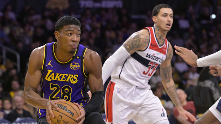 Jan 21, 2025; Los Angeles, California, USA; Los Angeles Lakers forward Rui Hachimura (28) drives past Washington Wizards forward Kyle Kuzma (33) in the second half at Crypto.com Arena. Mandatory Credit: Jayne Kamin-Oncea-Imagn Images Jan 21, 2025; Los Angeles, California, USA; Los Angeles Lakers forward Rui Hachimura (28) drives past Washington Wizards forward Kyle Kuzma (33) in the second half at Crypto.com Arena. Mandatory Credit: Jayne Kamin-Oncea-Imagn Images