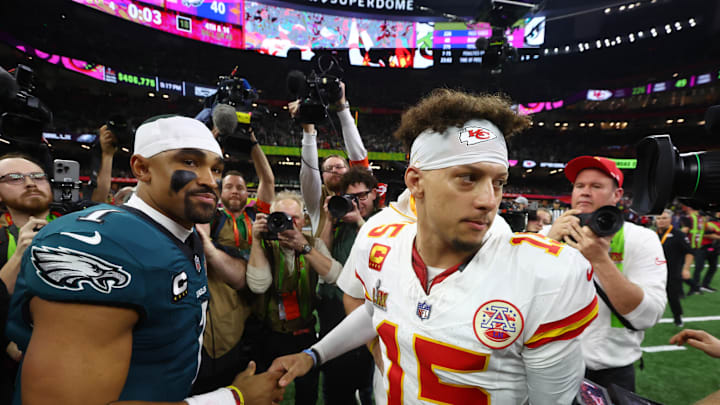 Feb 9, 2025; New Orleans, LA, USA; Philadelphia Eagles quarterback Jalen Hurts (1) shakes hands with Kansas City Chiefs quarterback Patrick Mahomes (15) after Super Bowl LIX at Ceasars Superdome. Mandatory Credit: Mark J. Rebilas-Imagn Images Feb 9, 2025; New Orleans, LA, USA; Philadelphia Eagles quarterback Jalen Hurts (1) shakes hands with Kansas City Chiefs quarterback Patrick Mahomes (15) after Super Bowl LIX at Ceasars Superdome. Mandatory Credit: Mark J. Rebilas-Imagn Images