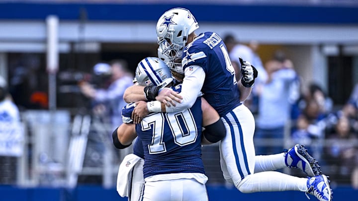 Dallas Cowboys quarterback Dak Prescott and guard Zack Martin celebrate