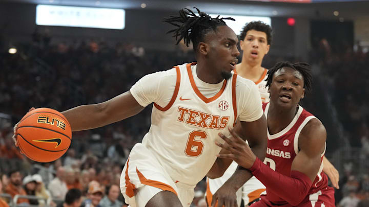 Feb 5, 2025; Austin, Texas, USA; Texas Longhorns forward Arthur Kaluma (6) drives to the basket while defended by Arkansas Razorbacks forward Adou Thiero (3) during the first half at Moody Center. Mandatory Credit: Scott Wachter-Imagn Images
