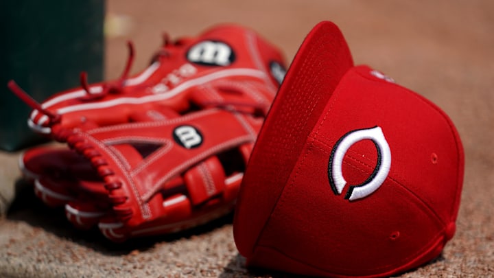 A view of a New Era on field Cincinnati Reds hat.