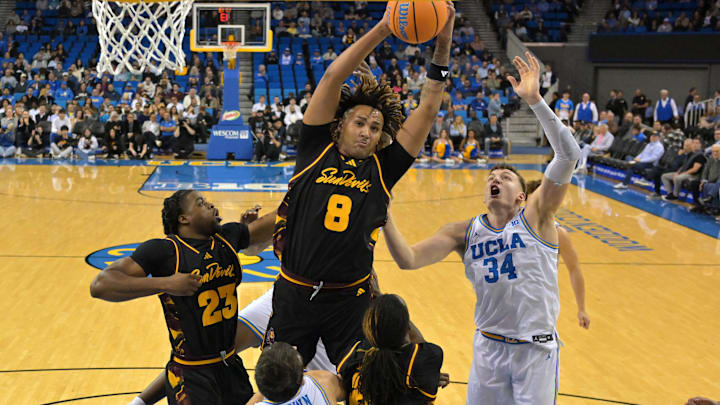 Dec 17, 2025; Los Angeles, California, USA;  Arizona State Sun Devils forward Marcus Adams Jr. (8) beats UCLA Bruins forward Tyler Bilodeau (34) to a rebound in the first half at Pauley Pavilion presented by Wescom Financial. Mandatory Credit: Jayne Kamin-Oncea-Imagn Images 
