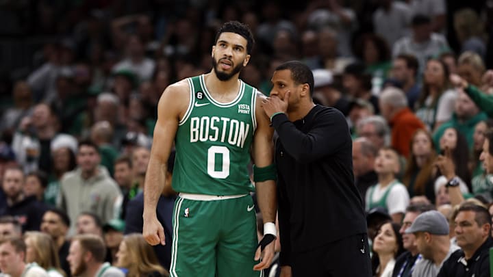 May 25, 2023; Boston, Massachusetts, USA; Boston Celtics forward Jayson Tatum (0) talks with head coach Joe Mazzulla during the first quarter of game five against the Miami Heat in the Eastern Conference Finals for the 2023 NBA playoffs at TD Garden. Mandatory Credit: Winslow Townson-Imagn Images
