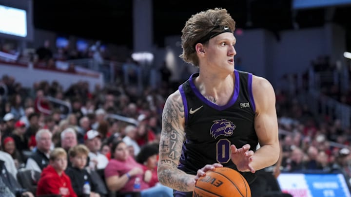 Nov 3, 2025; Cincinnati, Ohio, USA; Western Carolina Catamounts guard Cord Stansberry (0) dribbles the ball against the Cincinnati Bearcats in the second half at Fifth Third Arena. Mandatory Credit: Aaron Doster-Imagn Images Nov 3, 2025; Cincinnati, Ohio, USA; Western Carolina Catamounts guard Cord Stansberry (0) dribbles the ball against the Cincinnati Bearcats in the second half at Fifth Third Arena. Mandatory Credit: Aaron Doster-Imagn Images
