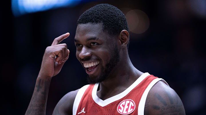 Oklahoma Sooners guard Duke Miles (15) reacts to his late-game play against the Georgia Bulldogs during their first round game of the SEC Men's Basketball Tournament at Bridgestone Arena in Nashville, Tenn., Wednesday, March 12, 2025. Instead of grabbing the ball that was rolling toward their goal, Miles let it go and forced the Georgia Bulldogs player to grab it for a backcourt violation.