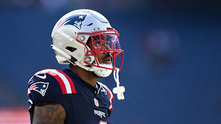 Oct 6, 2024; Foxborough, Massachusetts, USA;  New England Patriots wide receiver Ja'Lynn Polk (1) walks onto the field before a game against the Miami Dolphins at Gillette Stadium. Mandatory Credit: Brian Fluharty-Imagn Images