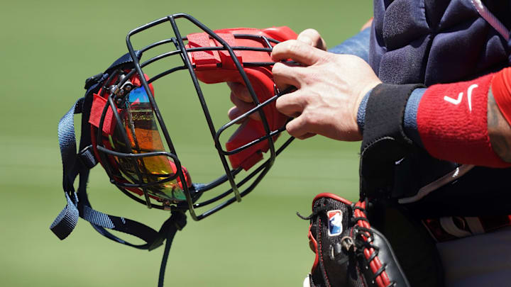Jul 4, 2021; Oakland, California, USA; Boston Red Sox catcher Christian Vazquez (7) holds a catchers mask before the game against the Oakland Athletics at RingCentral Coliseum. Mandatory Credit: Darren Yamashita-Imagn Images Jul 4, 2021; Oakland, California, USA; Boston Red Sox catcher Christian Vazquez (7) holds a catchers mask before the game against the Oakland Athletics at RingCentral Coliseum. Mandatory Credit: Darren Yamashita-Imagn Images