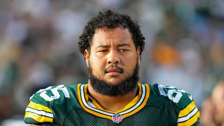 Green Bay Packers guard Aaron Banks (65) Green Bay Packers guard Aaron Banks (65)
