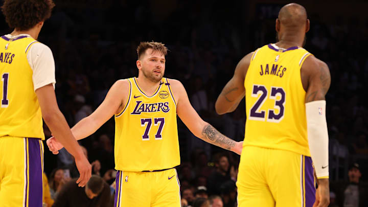 Feb 27, 2025; Los Angeles, California, USA; Los Angeles Lakers guard Luka Doncic (77) celebrates with forward LeBron James (23) after making a basket during the fourth quarter against the Minnesota Timberwolves at Crypto.com Arena. Mandatory Credit: Jason Parkhurst-Imagn Images Feb 27, 2025; Los Angeles, California, USA; Los Angeles Lakers guard Luka Doncic (77) celebrates with forward LeBron James (23) after making a basket during the fourth quarter against the Minnesota Timberwolves at Crypto.com Arena. Mandatory Credit: Jason Parkhurst-Imagn Images