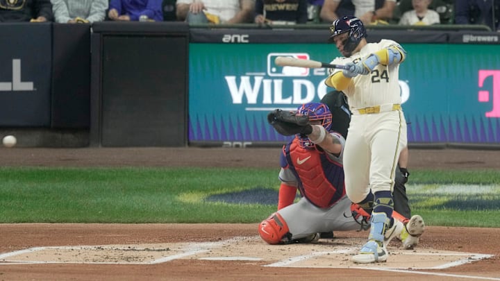 Milwaukee Brewers catcher William Contreras (24) hits an RBI single during the first inning of their wild-card playoff game against the New York Mets Tuesday, October 1, 2024 at American Family Field in Milwaukee, Wisconsin.