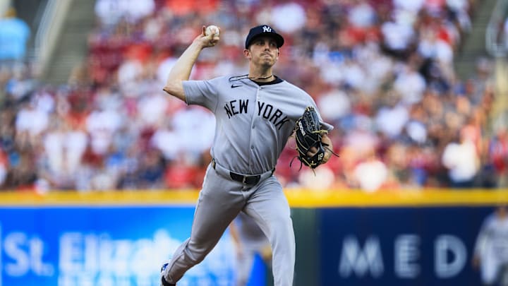 Jun 23, 2025; Cincinnati, Ohio, USA; New York Yankees starting pitcher Allan Winans (62) pitches against the Cincinnati Reds in the first inning at Great American Ball Park. Mandatory Credit: Katie Stratman-Imagn Images