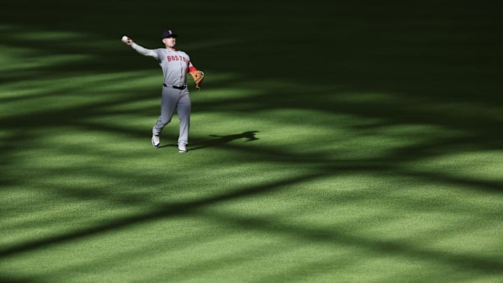 Aug 13, 2025; Houston, Texas, USA; Boston Red Sox third baseman Alex Bregman (2) warms up before playing against the Houston Astros at Daikin Park. Mandatory Credit: Thomas Shea-Imagn Images