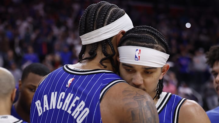 May 3, 2026; Detroit, Michigan, USA; Orlando Magic forward Paolo Banchero (5) hugs guard Anthony Black (0) after the game against the Detroit Pistons during game seven of the first round of the 2026 NBA Playoffs at Little Caesars Arena. Mandatory Credit: Rick Osentoski-Imagn Images