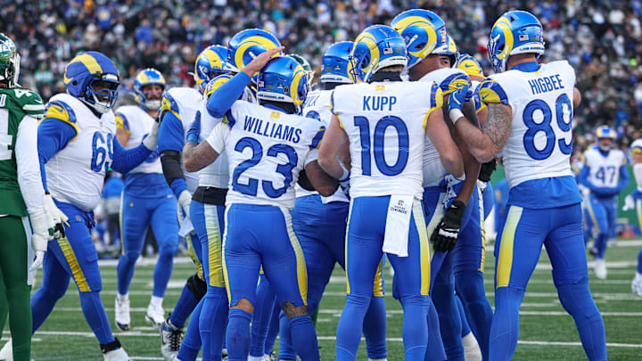 Dec 22, 2024; East Rutherford, New Jersey, USA; Los Angeles Rams running back Kyren Williams (23) celebrates his touchdown with teammates during the first half against the New York Jets at MetLife Stadium. Mandatory Credit: Vincent Carchietta-Imagn Images