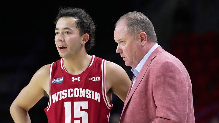 Wisconsin head coach Greg Gard talks with guard Owen Foxwell (15) during the second half of their preseason game Thursday, Oct. 15, 2026 at the Resch Center in Green Bay, Wisconsin. Wisconsin beat UW-Green Bay 96-77.
