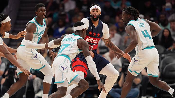 Washington Wizards forward Anthony Davis (23) watches for Charlotte Hornets guard Dennis Schroder 