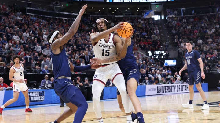 Mar 21, 2024; Salt Lake City, UT, USA; Dayton Flyers forward Daron Holmes II (15) drives through Nevada Wolf Pack players during the second half in the first round of the 2024 NCAA Tournament at Vivint Smart Home Arena-Delta Center. Mandatory Credit: Rob Gray-USA TODAY Sports Mar 21, 2024; Salt Lake City, UT, USA; Dayton Flyers forward Daron Holmes II (15) drives through Nevada Wolf Pack players during the second half in the first round of the 2024 NCAA Tournament at Vivint Smart Home Arena-Delta Center. Mandatory Credit: Rob Gray-USA TODAY Sports