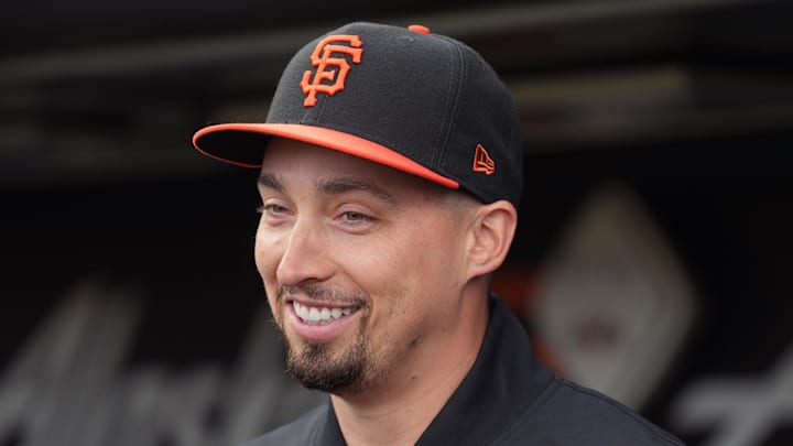 Apr 6, 2024; San Francisco, California, USA; San Francisco Giants pitcher Blake Snell (7) stands in the dugout before the game against the San Diego Padres at Oracle Park. Mandatory Credit: Darren Yamashita-Imagn Images