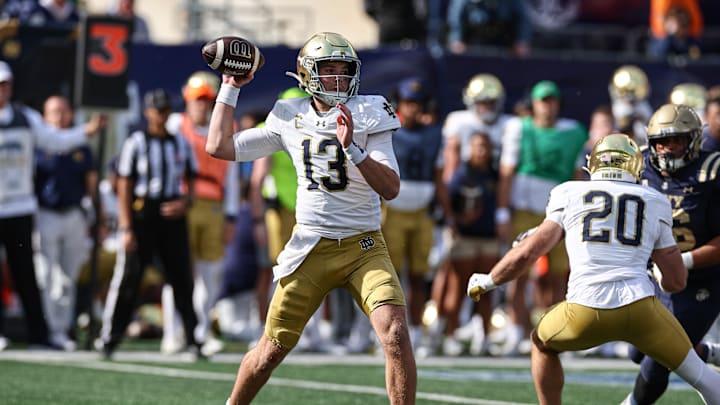 Oct 26, 2024; East Rutherford, New Jersey, USA; Notre Dame Fighting Irish quarterback Riley Leonard (13) throws the ball during the first half against the Navy Midshipmen at MetLife Stadium. Mandatory Credit: Vincent Carchietta-Imagn Images