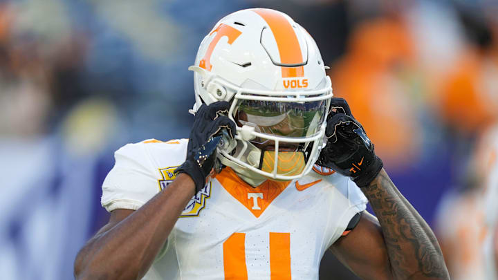 Tennessee wide receiver Mike Matthews (4) adjusts his helmet during warm-ups at the 2025 Music City Bowl at Nissan Stadium in Nashville, Tenn., on Dec. 30, 2025.