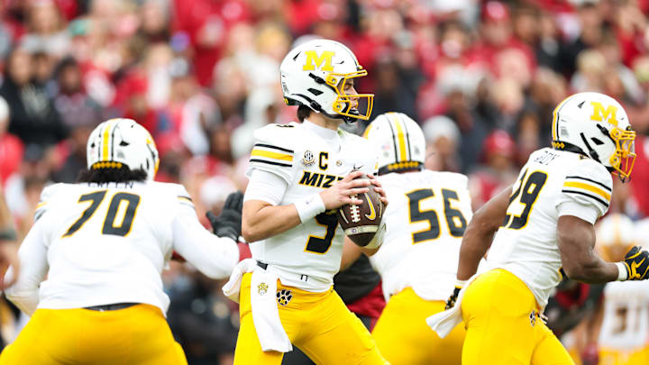 Nov 22, 2025; Norman, Okla.; Missouri quarterback Beau Pribula (9) throws during the first half against Oklahoma.