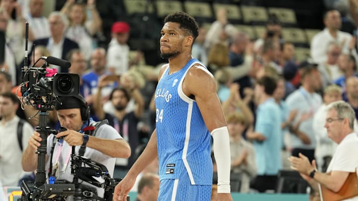 Aug 6, 2024; Paris, France; Greece small forward Giannis Antetokounmpo (34) reacts after their loss against Germany during a menís basketball quarterfinal game during the Paris 2024 Olympic Summer Games at Accor Arena. Mandatory Credit: Kyle Terada-Imagn Images