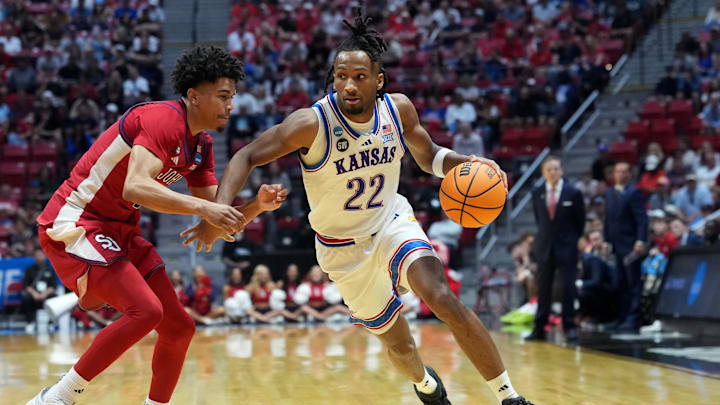 Mar 22, 2026; San Diego, CA, USA; Kansas Jayhawks guard Darryn Peterson (22) controls the ball against St. John's Red Storm guard Oziyah Sellers (4) in the second half during a second round game of the men's 2026 NCAA Tournament at Viejas Arena. Mandatory Credit: Kirby Lee-Imagn Images Mar 22, 2026; San Diego, CA, USA; Kansas Jayhawks guard Darryn Peterson (22) controls the ball against St. John's Red Storm guard Oziyah Sellers (4) in the second half during a second round game of the men's 2026 NCAA Tournament at Viejas Arena. Mandatory Credit: Kirby Lee-Imagn Images
