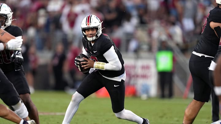 Oct 19, 2024; Stanford, California, USA; Stanford Cardinal quarterback Elijah Brown (2) carries the ball against the Southern Methodist Mustangs during the second quarter at Stanford Stadium. Mandatory Credit: Darren Yamashita-Imagn Images