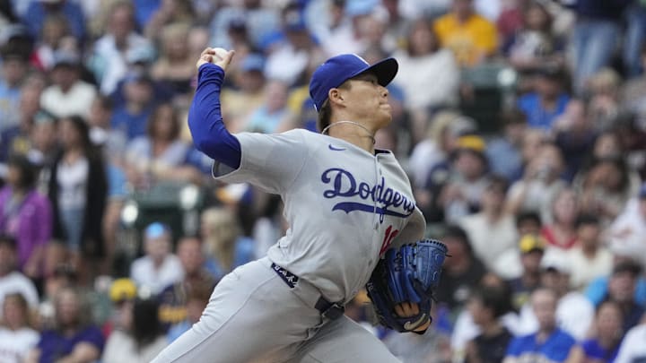 Jul 7, 2025; Milwaukee, Wisconsin, USA; Los Angeles Dodgers pitcher Yoshinobu Yamamoto (18) delivers a pitch against the Milwaukee Brewers in the first inning at American Family Field. Mandatory Credit: Michael McLoone-Imagn Image Jul 7, 2025; Milwaukee, Wisconsin, USA; Los Angeles Dodgers pitcher Yoshinobu Yamamoto (18) delivers a pitch against the Milwaukee Brewers in the first inning at American Family Field. Mandatory Credit: Michael McLoone-Imagn Image